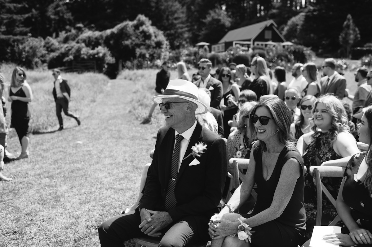 Karen and Bruce, your hosts, photographed at a wedding